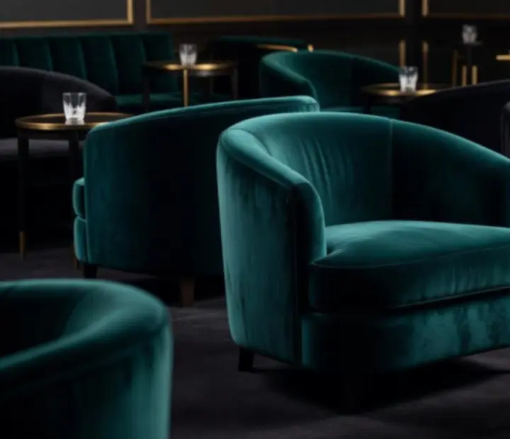 Luxurious salon seating with pendant lighting and jade and walnut décor
