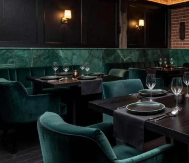 Mood-lit private bistro dining room set for an intimate event